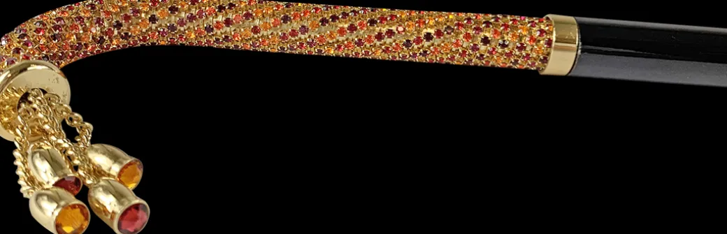 Bastone da passeggio incrostato con cristalli multicolori rossi e aran