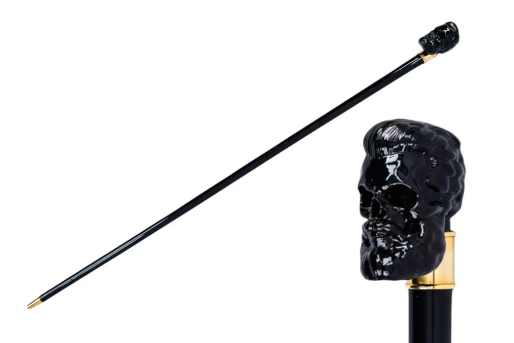 Elegant Cane with Sculpted Black Skull Handle and Gold Accents