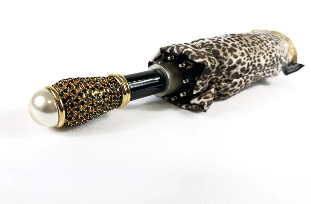 Elegante ombrello con disegno in pizzo e leopardo