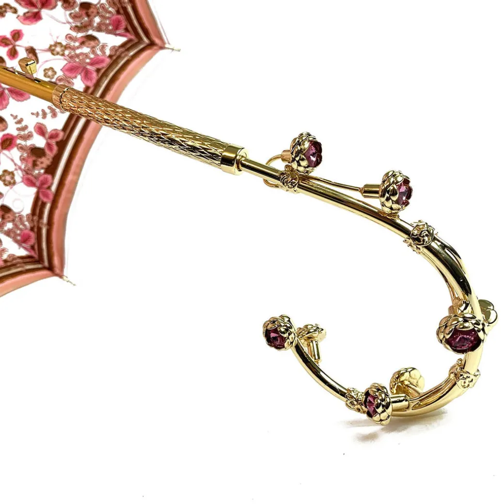 Fantastico ombrello rosa chiaro con speciale manico a fiori