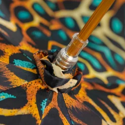 Wild Elegance: Teal Umbrella with Leopard Print and Green Crystal Hand