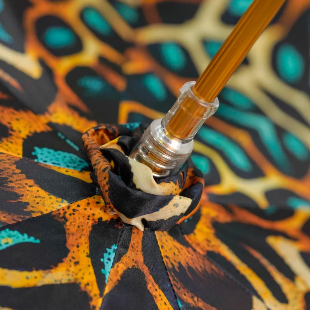 Wild Elegance: Teal Umbrella with Leopard Print and Green Crystal Hand
